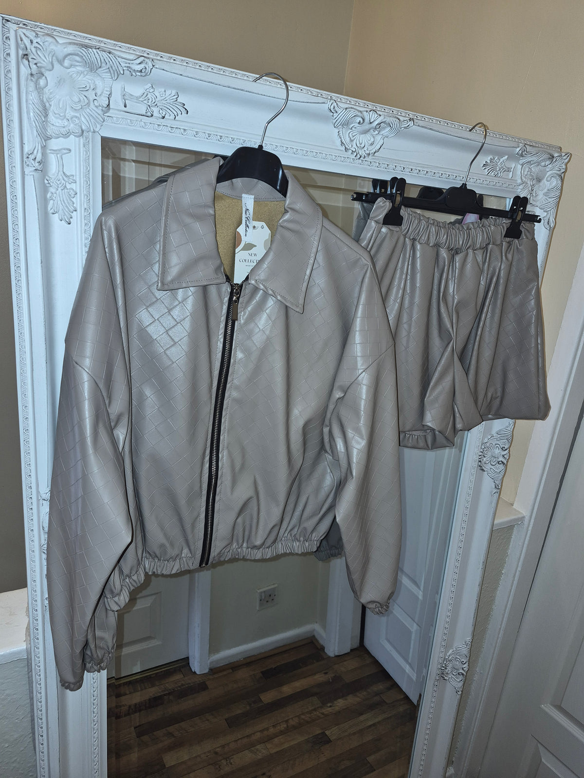 Beige leatherette suit £40
